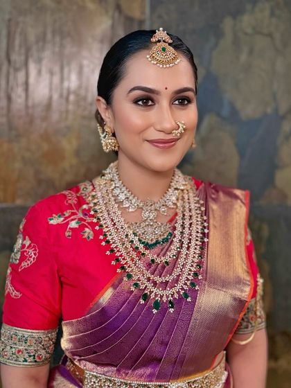 A classic portrait pose, exuding confidence and timeless South Indian charm.