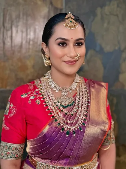 A classic portrait pose, exuding confidence and timeless South Indian charm.