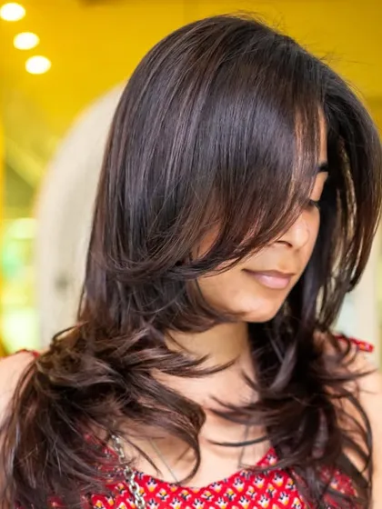 A great style starts with a flawless cut. We crafted this look with soft, face-framing layers and a bouncy blowout to create incredible volume, movement, and shine.