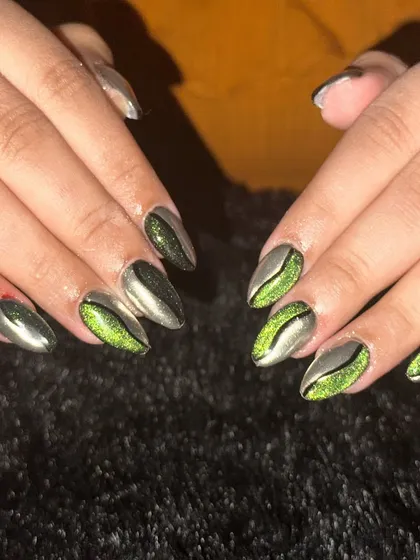 An edgy design combining a silver cat-eye base with a vibrant green cat-eye accent for a dual-tone look.
