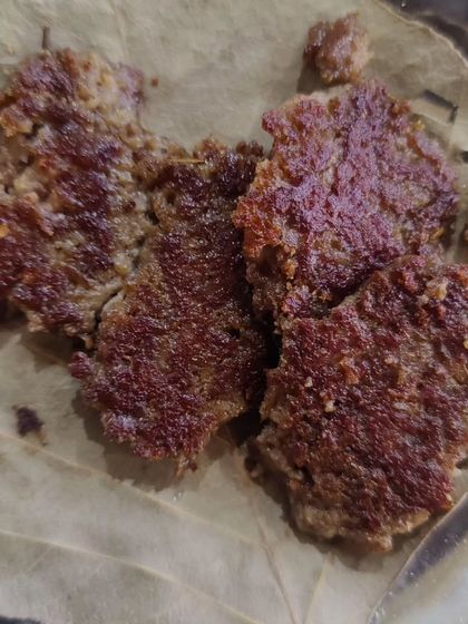 Galouti kebabs served the traditional way on a leaf. These are another melt-in-your-mouth specialty from Lucknow.