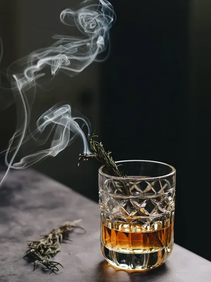 My work also includes creating moody and sophisticated visuals for beverages. The dance of smoke from a torched rosemary sprig adds drama and aroma to this cocktail, creating an image that engages more than just the sense of sight.