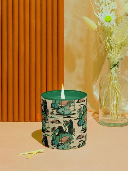 This pattern applied to a scented candle, showing its versatility for home decor products.
