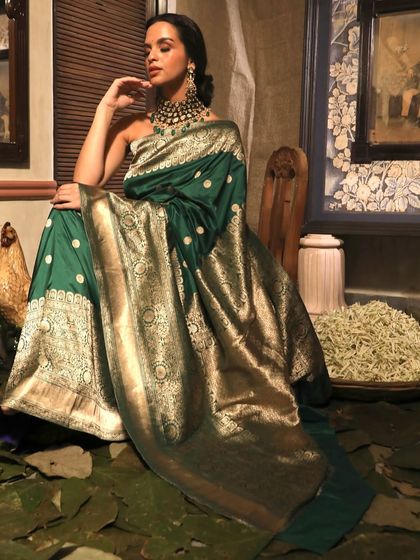 A wide shot that captures the grandeur of the entire ensemble and the beautifully decorated set. We can accommodate complex set designs to create a complete visual experience for your brand's collection.