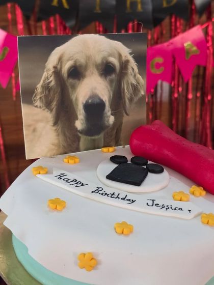 A close-up of Jessica's beautiful birthday cake, complete with her photo.