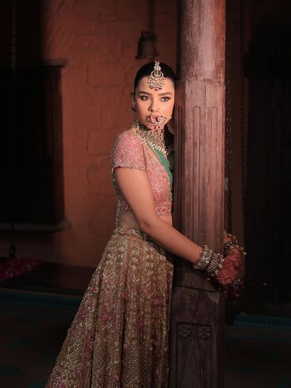 A portrait of my Anand Karaj bride, showcasing her regal haveli-inspired look. The makeup is luminous and dewy, with a delicate sparkle in the eyes to complement her magnificent jewellery.