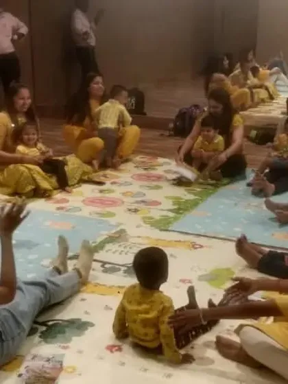 A view of our class enjoying a song while lying on their backs. We incorporate a variety of movements and positions to keep the children engaged and comfortable.