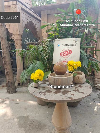 This fountain, sold to a client in Mumbai, is shown in a garden setting. Its compact size makes it incredibly versatile for any space, big or small.