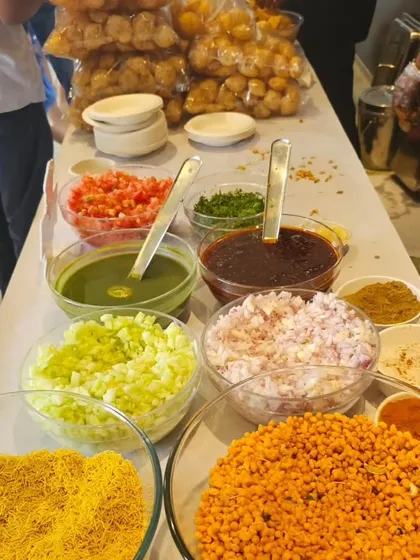 Bring the vibrant flavors of Indian street food to your party with a live chaat counter. This Bhel Puri station, with all its fresh toppings, is a fun, customizable option that guests of all ages love.