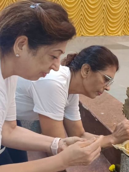 Two of our community members lighting the lamp to inaugurate our International Yoga Day event. It is a beautiful tradition that we share with our tribe, setting a positive intention for our time together.