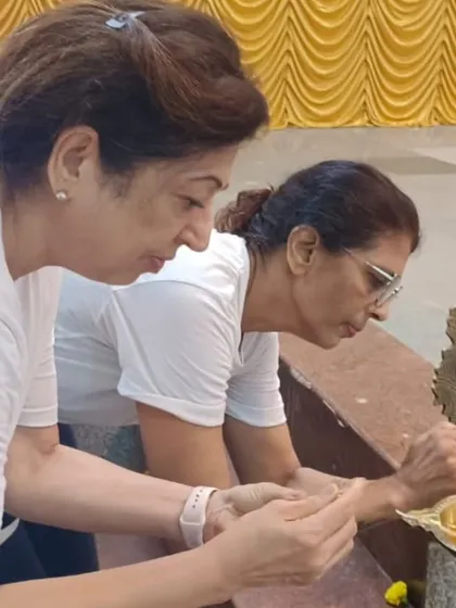 Two of our community members lighting the lamp to inaugurate our International Yoga Day event. It is a beautiful tradition that we share with our tribe, setting a positive intention for our time together.
