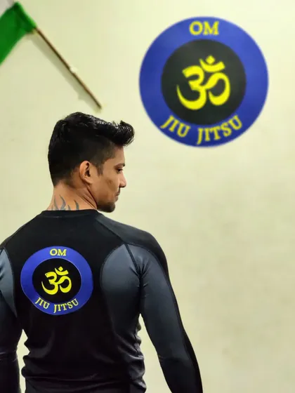 The back of our new rashguard, featuring the Om Jiu-Jitsu logo. This represents our team and our shared commitment to martial arts.