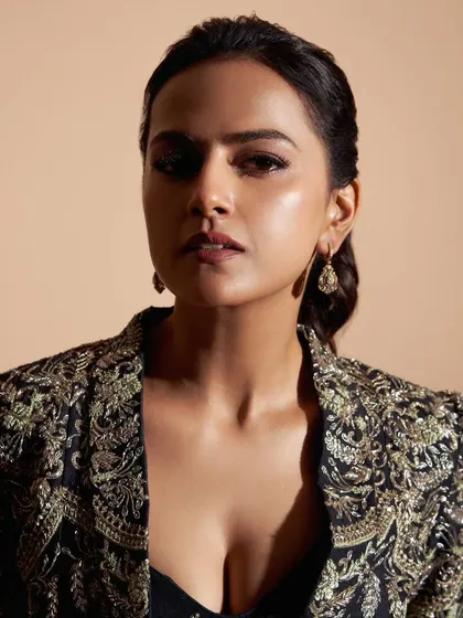 A close-up of the embroidered jacket I styled for Shraddha Srinath. This piece adds a touch of glamour and intricate detail to a simple black outfit, making it perfect for an evening event.