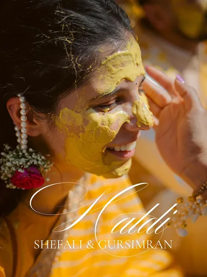 A close-up of the bride's radiant smile during her Haldi ceremony. We focus on capturing the vibrant colors and genuine emotions of pre-wedding rituals, preserving these joyful memories forever.