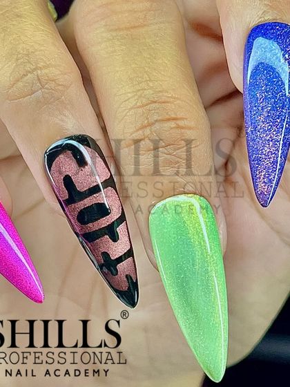 A vibrant set of stiletto nails showcasing different colors and effects, including cat eye, chrome, and solid brights.