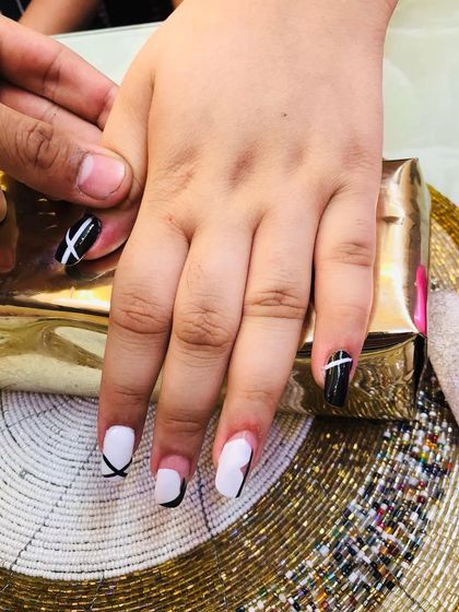 A minimalist and graphic design with a black and white color block style.