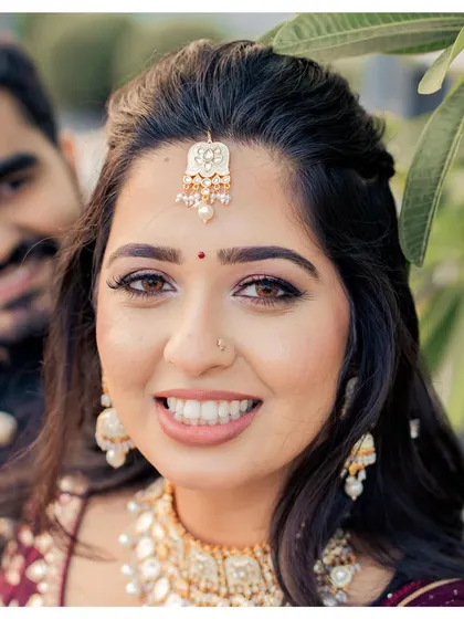 And then you could feel the love in the air. A happy, close-up shot of Akshaya and her partner.