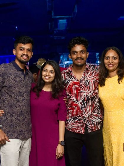 This group is dressed in vibrant colors, matching the energy of the pub.