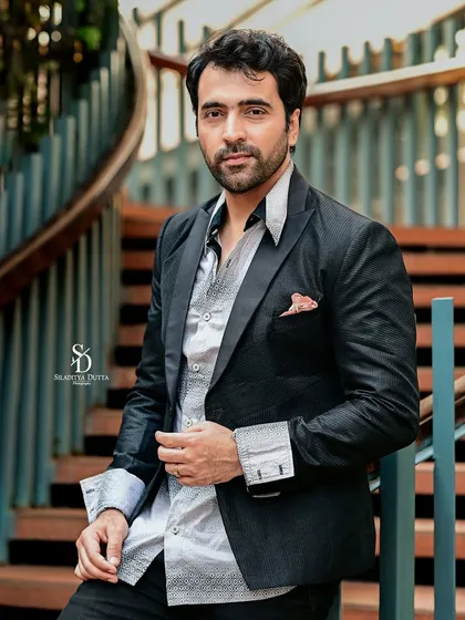 A sharp and stylish portrait of actor Abir Chatterjee for Onnosomoy. The modern blazer and his direct gaze project confidence and sophistication, perfect for a formal feature.