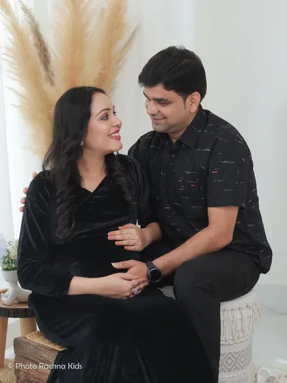 A candid moment of connection. We encourage couples to interact naturally, capturing the quiet looks and smiles that tell their unique love story.