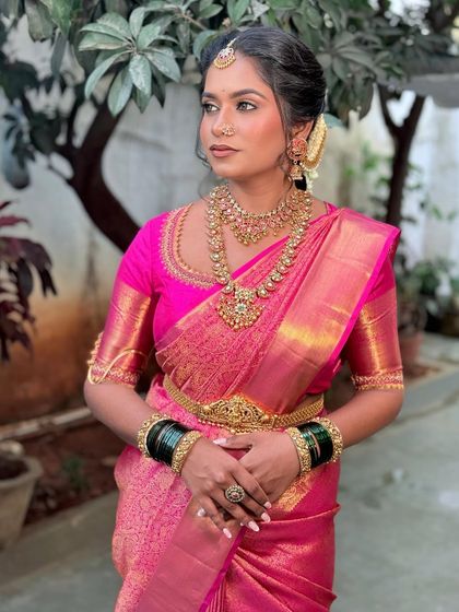 A beautiful portrait of Sushmitha. Her makeup is fresh and radiant, with a focus on flawless skin and defined eyes.