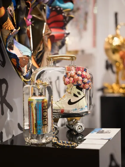 A display of smaller, intricate sculptures at The Wedding Collective. These pieces demonstrate that pop art can be both bold and detailed.