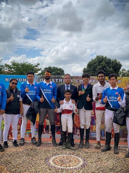 Team REA celebrating a bronze medal win at the Army Grounds. Our collaboration with Team Manipur and other riders highlights the spirit of sportsmanship in the equestrian community.
