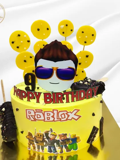 Level up your celebration with a Roblox-themed cake. This bright yellow cake, complete with character prints and chocolate-covered cakesicles, was designed for a 9th birthday, capturing the fun and creativity of the popular game.