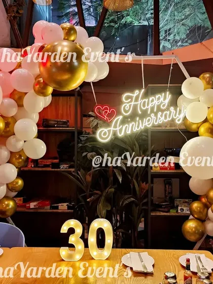 Another view of the intimate 30th anniversary decor, perfect for a restaurant or home setting.