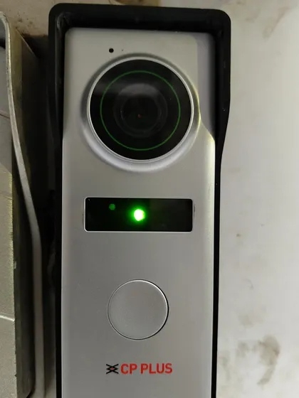 Here is the outdoor camera unit we install at your entrance. It has a high-quality 1.2 MP camera and powerful night vision, so you get a clear picture day or night. This is a genuine CP Plus video door phone camera, built to last.