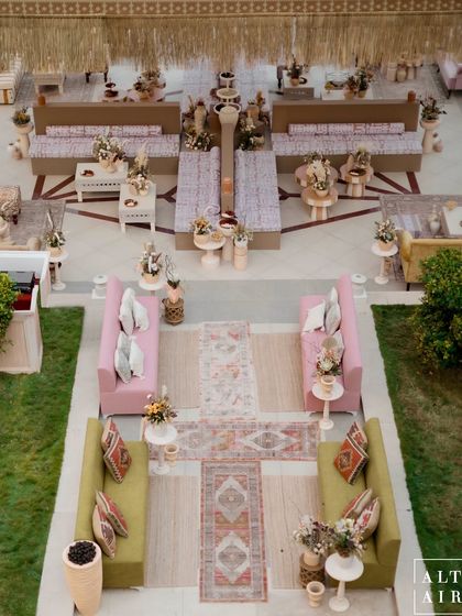 A lounge setup from our Doha wedding, showcasing a heritage-meets-modern design. We used a fresh, neutral yet eclectic palette with layered rugs and comfortable seating to evoke the feel of a bustling souk.