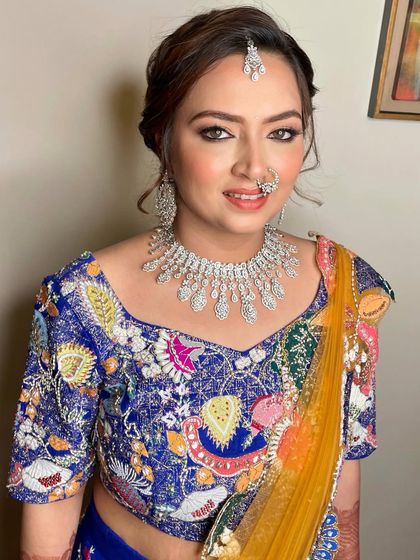 A portrait of the bride, looking radiant and ready for the celebration. The diamond jewelry adds the perfect amount of sparkle.