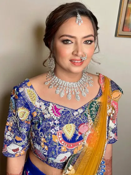 A portrait of the bride, looking radiant and ready for the celebration. The diamond jewelry adds the perfect amount of sparkle.