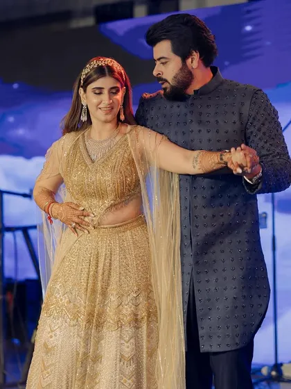 A beautiful moment from a couple's duet on their sangeet night. We choreograph routines that tell your story through every step and glance.