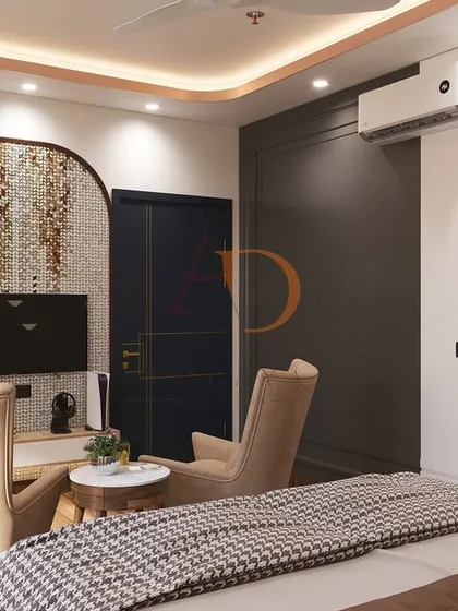 This bedroom features a unique arched mosaic tile backdrop for the TV and workspace, adding texture and an organic feel to the room.