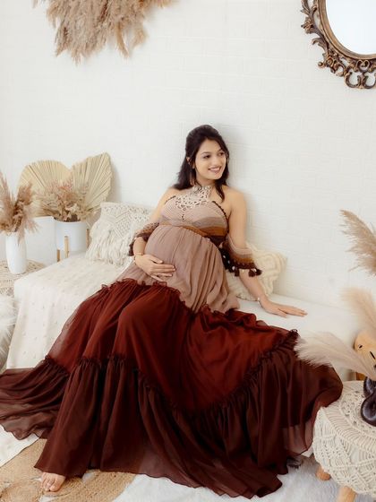 Our two-toned Boho gown is perfect for a relaxed, comfortable shoot. The halter-neck top and tiered skirt create a unique, free-spirited look.