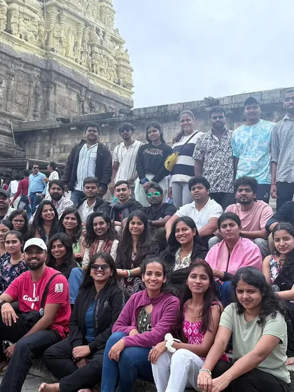 All smiles on the steps of a historic temple. Our trips are designed to be a perfect blend of adventure, nature, and local exploration.