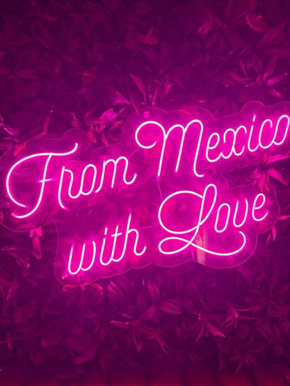 The neon sign at Miss Margarita adds so much to the vibe. I often capture these decor elements to give my audience a complete feel for the restaurant's atmosphere, not just the food.