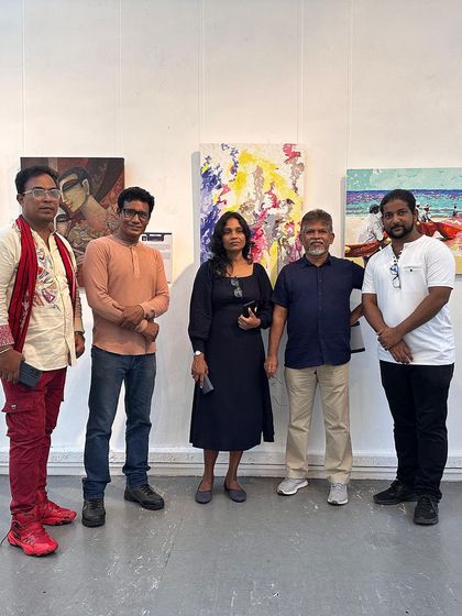 Posing with fellow artists and visitors on the 6th day of the International Group Art Exhibition in Colombo, Sri Lanka.