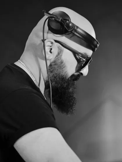 No colors, just energy. A black and white shot capturing the intense focus required behind the decks. This is how we do Sundays.