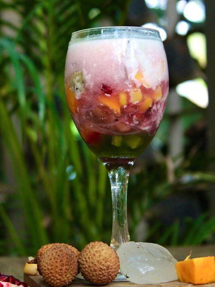 Our weekend special, Ice Kachang, is the perfect dessert for a scorching day. It's a refreshing mix of crushed ice, red beans, and tropical fruits, drizzled with coconut mylk.