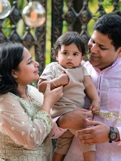 Our studio is designed to capture beautiful moments with the entire family. These images show how parents and grandparents can join the fun, creating cherished family portraits.