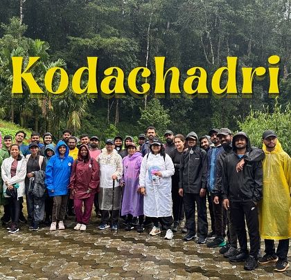 The full Kodachadri crew in their rain gear, ready to take on the misty trails.