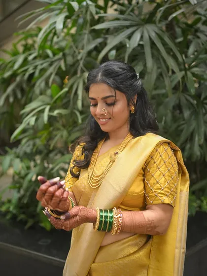 Another shot of the bride admiring her ring, her smile radiant.
