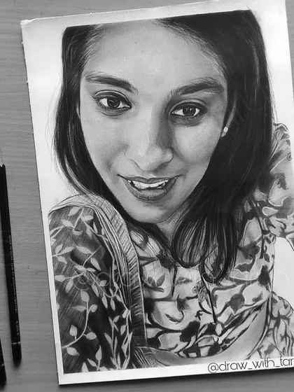 A black and white photo of the finished A4 commission, highlighting the tonal values achieved with graphite and charcoal.