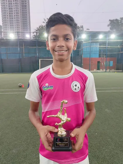 Wilfred John with his well-deserved award for Best Playmaker. Individual awards are a great reminder that our players' efforts are being recognized.