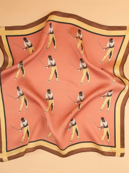 A draped view of the pink golfer pocket square, highlighting the sheen and texture of the fabric.