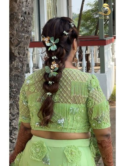 Another angle of the floral Mehendi braid, perfect for a beachside event.