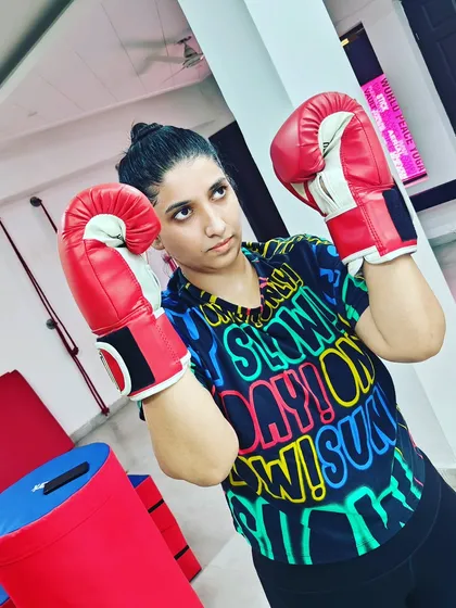 You will not always be motivated, so you must learn to be disciplined. Here I am, ready for a boxing workout, focused and determined.