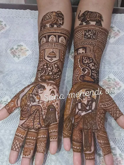 We captured this couple's story with portraits and important wedding rituals. This custom bridal mehendi includes figures, elephant motifs, and intricate details that tell a personal story.